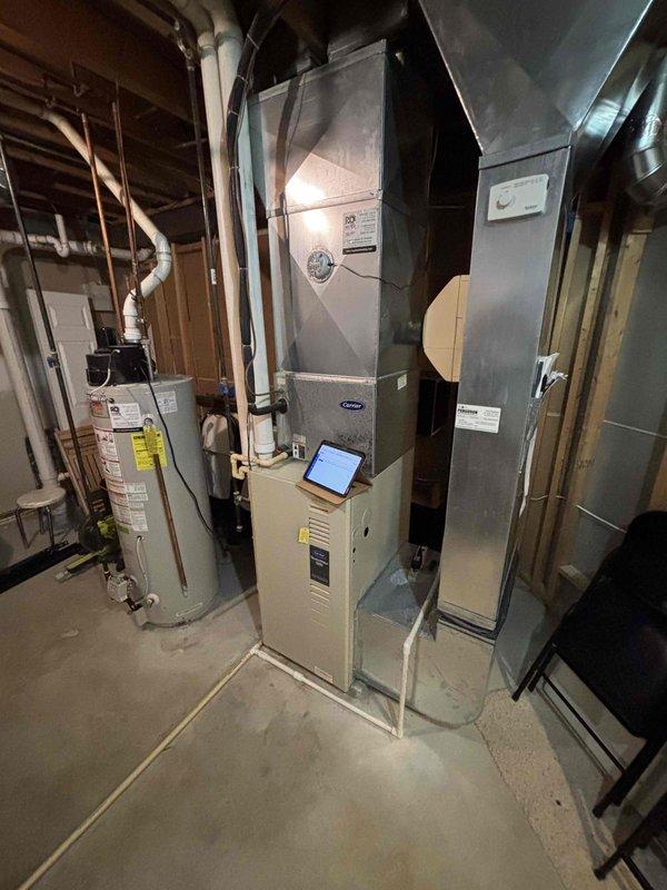 Provided comprehensive estimate for replacement of 30+ year old furnace and air conditioning system located in basement mechanical room. Current natural gas furnace and AC unit remain operational but have exceeded expected service life. Evaluated existing equipment configuration, ductwork layout, venting system, electrical connections, and condensate drainage to determine optimal replacement specifications and installation requirements for new high-efficiency HVAC system.