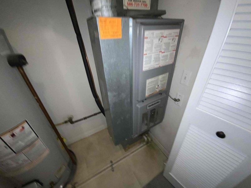 Provided comprehensive estimate for complete HVAC system replacement including furnace and air conditioning units under BOGO promotion. Existing 21-year-old natural gas furnace located in upstairs closet and air conditioning unit positioned at front of house are non-operational and require full replacement. Evaluated installation locations, documented current equipment conditions, assessed ductwork and utility connections, and photographed existing systems to develop accurate replacement specifications for dual-unit residential HVAC installation.
