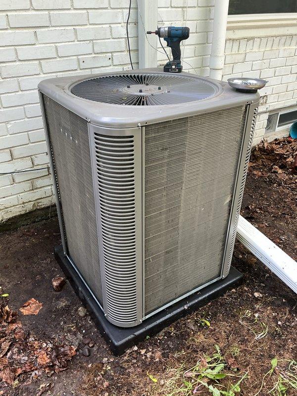 Completed annual preventative maintenance on residential split system air conditioning unit. Performed comprehensive inspection of outdoor condensing unit, verified proper operation of compressor and condenser fan motor, checked refrigerant lines for leaks and proper insulation, and cleaned condenser coil fins to ensure optimal airflow and heat transfer efficiency. Unit found to be operating within normal parameters with no immediate service needs identified.
