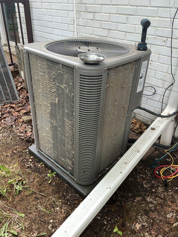 Completed annual preventative maintenance on residential split system air conditioning unit. Performed comprehensive inspection of outdoor condensing unit, verified proper operation of compressor and condenser fan motor, checked refrigerant lines for leaks and proper insulation, and cleaned condenser coil fins to ensure optimal airflow and heat transfer efficiency. Unit found to be operating within normal parameters with no immediate service needs identified.