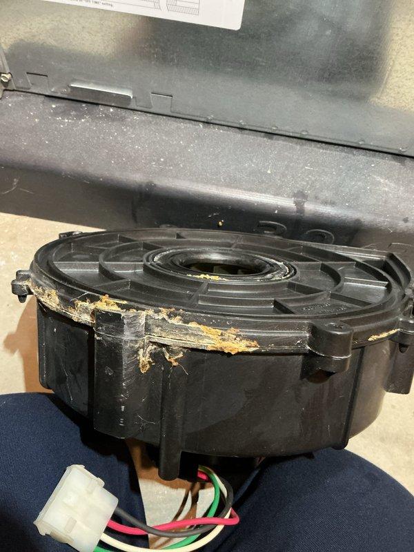 Completed annual cooling maintenance on residential HVAC system. Replaced air filter, evaporator pad, and UV bulb as scheduled. Inspected blower motor assembly and noted deterioration of plastic housing with visible cracking and delamination requiring future attention. Verified proper operation of all system components and plumbing connections during maintenance visit.