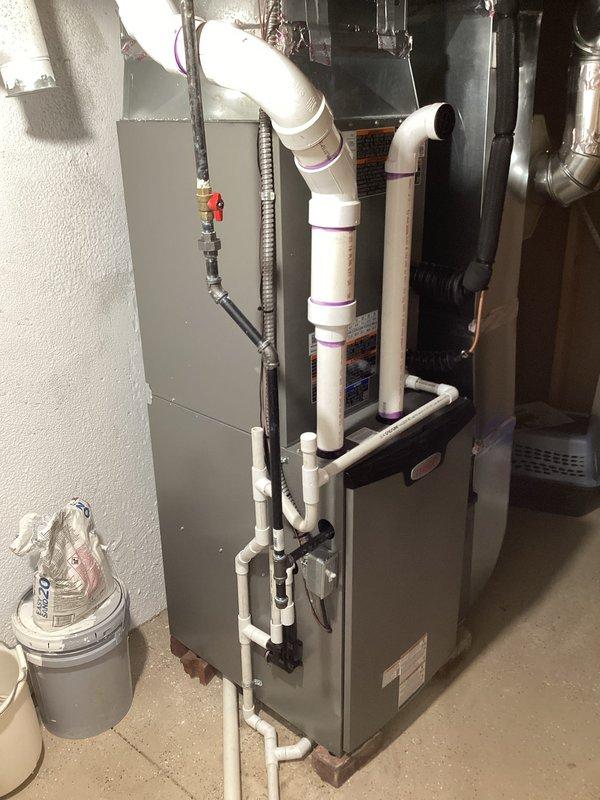 Completed full HVAC system installation including a 90,000 BTU gas furnace and 3-ton air conditioning unit with rear discharge configuration. Obtained mechanical and electrical permits prior to installation, installed all required PVC venting and drainage piping, connected gas line with shut-off valve, and established proper electrical connections. All equipment properly mounted, tested, and reconnected to existing ductwork distribution system.