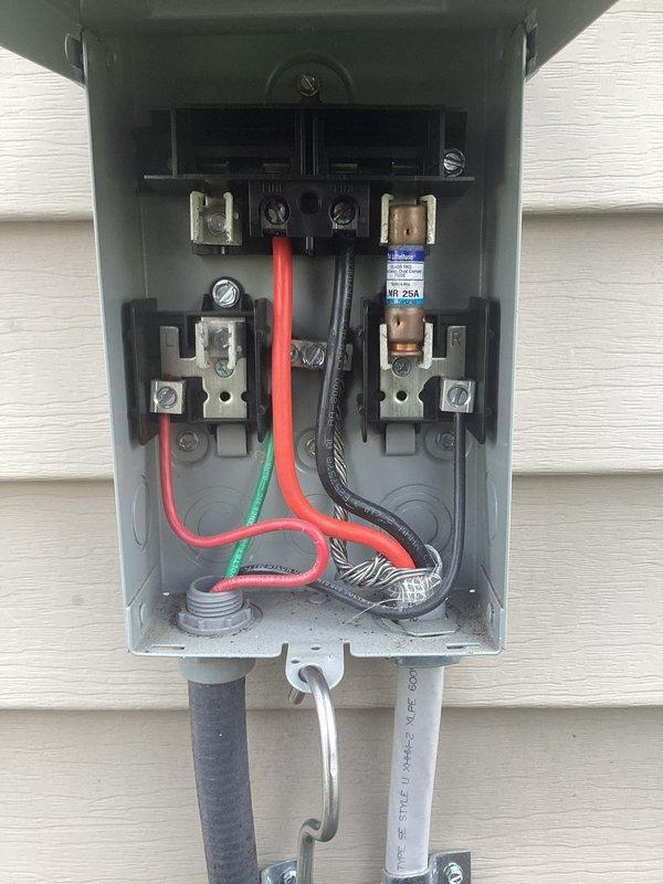 # HVAC Service Report

Responded to no-cooling complaint on 5-year-old air conditioning system. Upon arrival, performed system diagnostics using digital manifold gauges to assess refrigerant pressures and temperatures. High-side pressure reading showed 234 psig with elevated temperature of 335°F, indicating potential system issues.

Inspected electrical disconnect box at outdoor unit, verifying proper fuse installation and electrical connections. Confirmed 25-amp fusing was intact and all wire terminations at bus bars and terminal blocks were secure. Checked power supply connections including line voltage wiring.

Connected refrigerant manifold with service hoses to system ports for comprehensive pressure and temperature analysis. Monitored superheat and subcooling values to determine refrigerant charge status and system performance. Documented readings on digital gauge display for accurate diagnostics.

Performed visual inspection of outdoor unit components and electrical supply syste