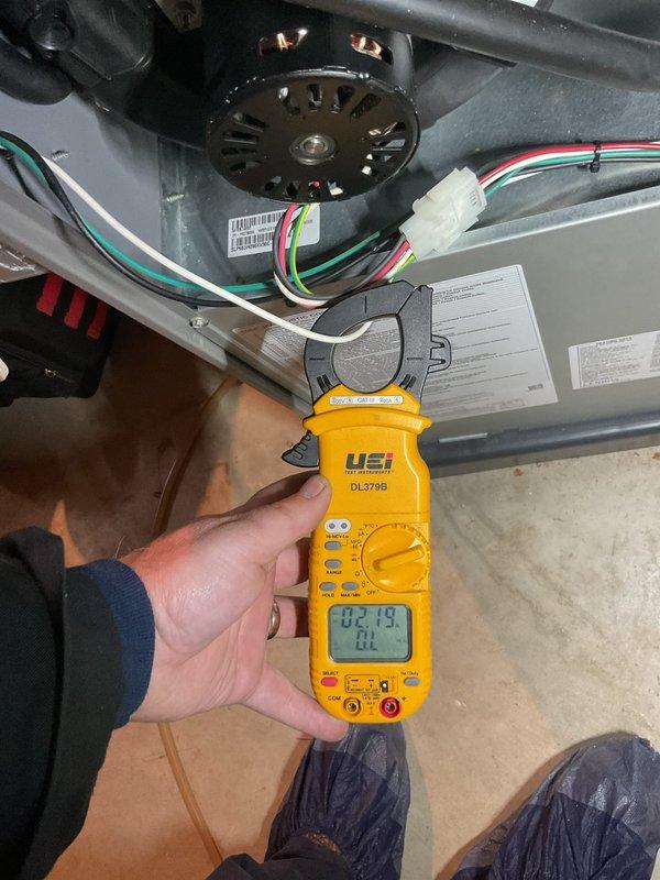Completed annual cooling maintenance on residential air conditioning system. Performed comprehensive electrical diagnostics using digital multimeter to verify proper voltage and amperage at both the indoor air handler and outdoor condensing unit disconnect. Tested all electrical connections, measured system performance parameters, and confirmed equipment operating within manufacturer specifications. System found to be functioning properly with no deficiencies noted. Unit operational and ready for cooling season.