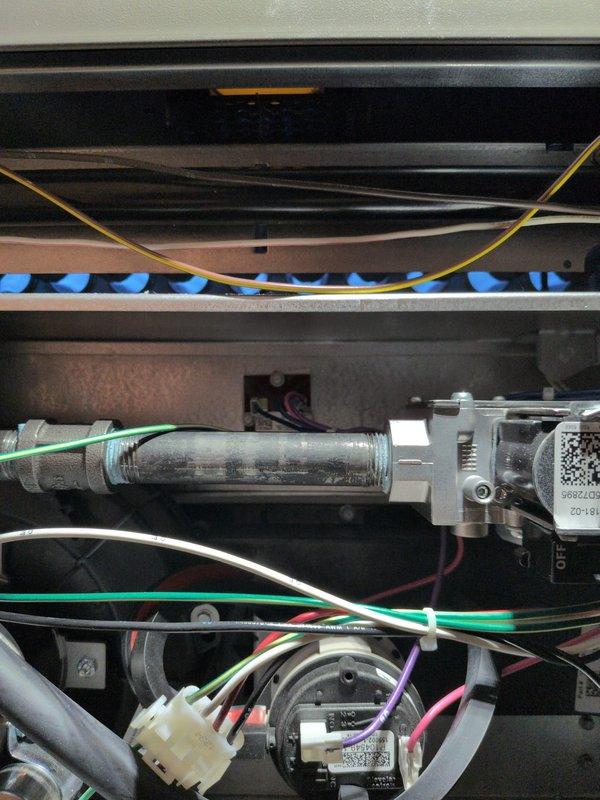 Completed comprehensive routine maintenance on one-year-old forced air furnace and air conditioning system with no reported issues. Performed AC tune-up including temperature differential measurements, verified proper system operation at 64°F supply air temperature, and inspected all critical components. Conducted thorough examination of furnace burner assembly, confirmed proper ignition sequence with all flame sensors functioning correctly, verified gas valve operation, inspected heat exchanger sight glass for clarity, and checked all electrical connections and wiring harnesses for secure mounting and proper termination. All systems operating within manufacturer specifications with no deficiencies noted.