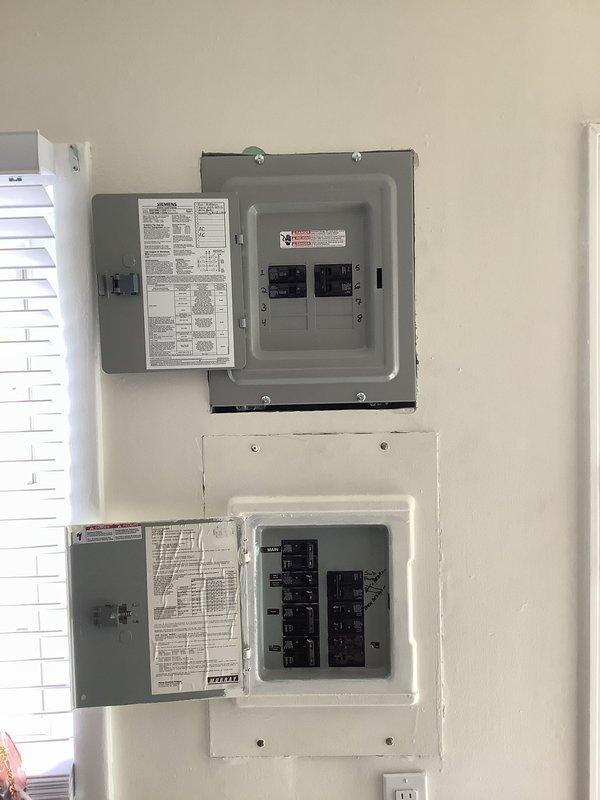 Completed full HVAC system installation including a 2-ton air conditioning unit with rear discharge configuration, hot water heater replacement, and electrical sub panel installation. Installed and wired new sub panel to accommodate increased electrical load from HVAC equipment, ensuring proper circuit protection and code compliance. All equipment tested and operational upon completion, with system verified for proper airflow, electrical connections, and safety controls.