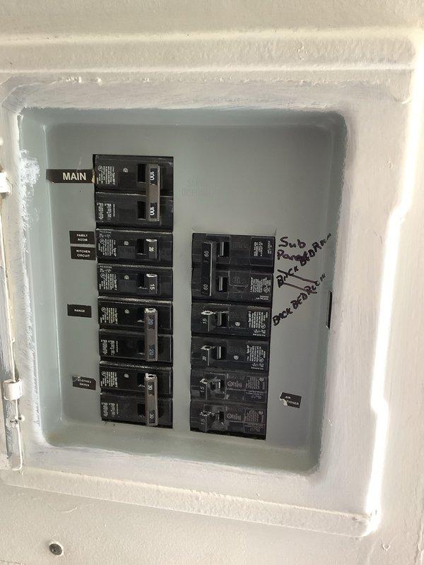 Completed full HVAC system installation including a 2-ton air conditioning unit with rear discharge configuration, hot water heater replacement, and electrical sub panel installation. Installed and wired new sub panel to accommodate increased electrical load from HVAC equipment, ensuring proper circuit protection and code compliance. All equipment tested and operational upon completion, with system verified for proper airflow, electrical connections, and safety controls.