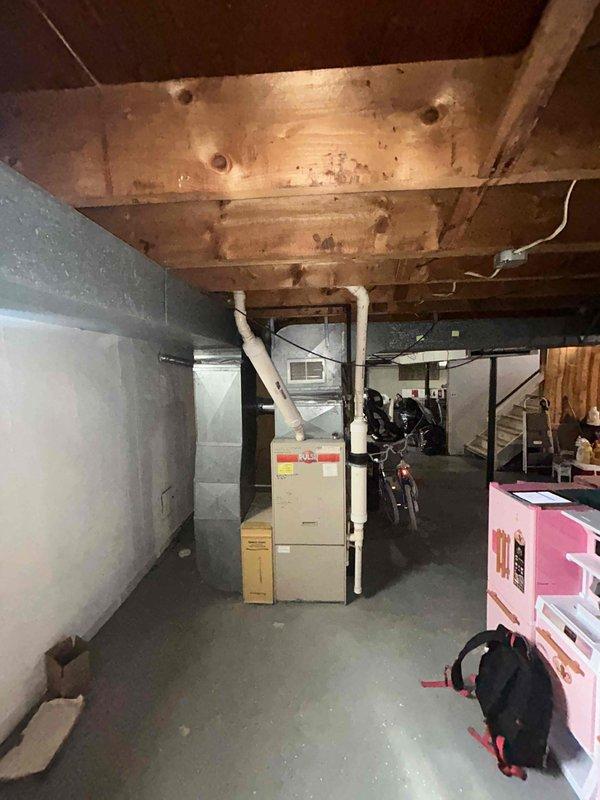 Conducted comprehensive full system estimate for residential HVAC replacement in basement installation. Evaluated existing 16-year-old furnace and air conditioning system, both requiring replacement due to age and operational inefficiency. Assessed basement utility area layout, existing ductwork configuration, venting infrastructure including current PVC exhaust piping, and available clearances for new equipment installation. Documented current forced-air heating system, sheet metal ductwork distribution network, and spatial constraints including proximity to water heater and stored items. Provided replacement options and recommendations for complete furnace and central air conditioning system upgrade to meet customer's timeline of replacement within one month.