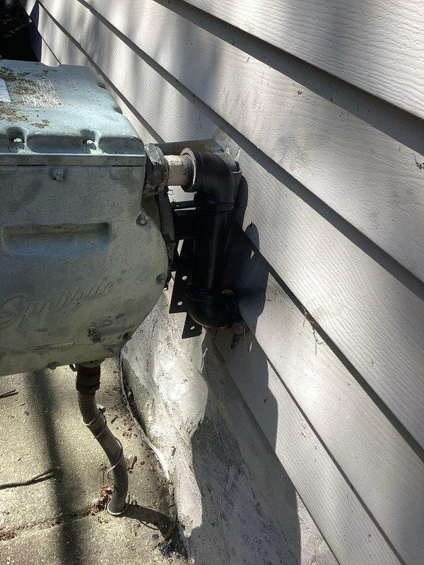 Installed 1-inch gas pipe from existing utility connection point on exterior wall through basement to prepare for new gas meter installation by utility company. Routed new gas line along basement ceiling joists following proper code requirements and secured with appropriate hangers, positioning line for future tankless water heater connection once utility company completes meter upgrade.