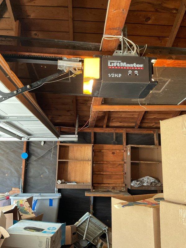 Completed comprehensive whole home electrical inspection of residential property. Performed thorough evaluation of exterior electrical service entrance, utility metering equipment, and exterior conduit installations mounted on brick exterior walls. Inspected all visible electrical wiring, connections, and service lines for code compliance and safety hazards.

Conducted interior electrical system assessment including garage electrical components and garage door opener system with LiftMaster 1/2HP unit. Verified proper installation of safety sensors, emergency release mechanisms, and electrical connections to ceiling-mounted equipment. Evaluated electrical panel accessibility, branch circuit distribution, and grounding systems throughout the residence. Documented all findings with photographic evidence for customer records. All systems inspected and findings reported to homeowner for any necessary follow-up recommendations.