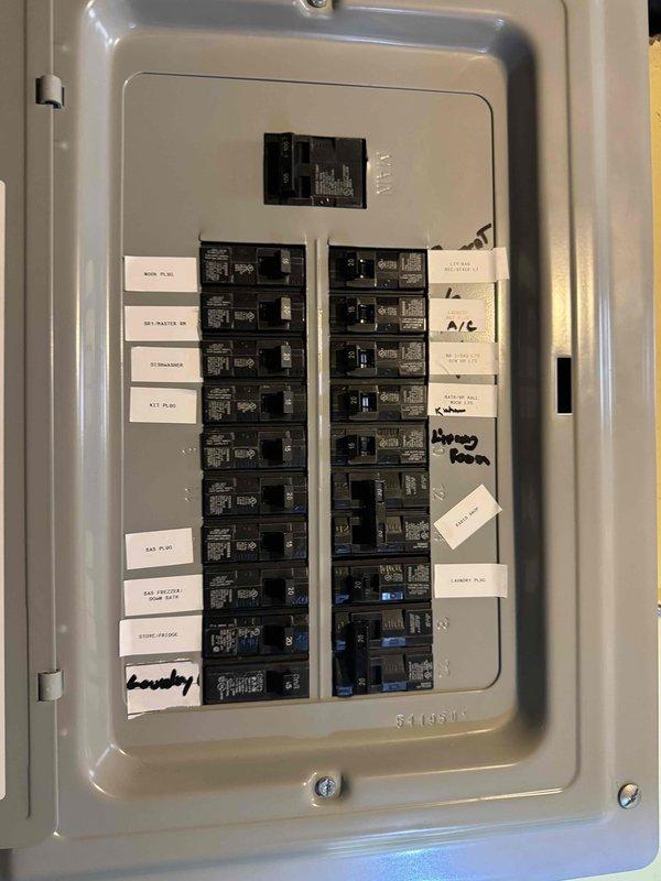 Conducted site evaluation for ductless mini-split system installation at two-story brick residential property. Assessed exterior mounting locations, photographed building structure including potential condensing unit placement areas, and inspected existing electrical panel to verify capacity and available circuits for new system installation. Customer requested estimate for installation to be completed within the next two months.