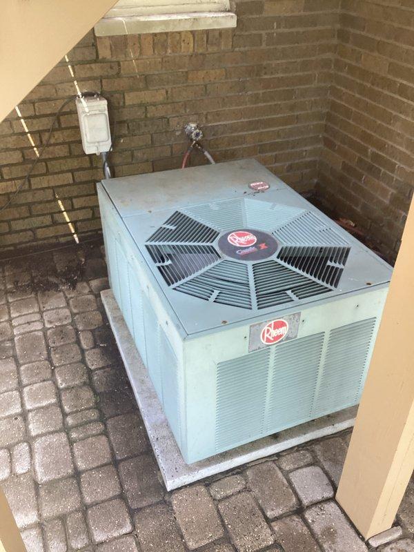 Completed annual cooling maintenance on two residential air conditioning systems located in exterior alcove. Performed comprehensive ACM service including visual inspection of both condenser units, verified proper operation of compressors and fan motors, checked electrical connections and disconnect boxes, and documented equipment condition with photographs. Both units operational with no deficiencies noted at time of service.