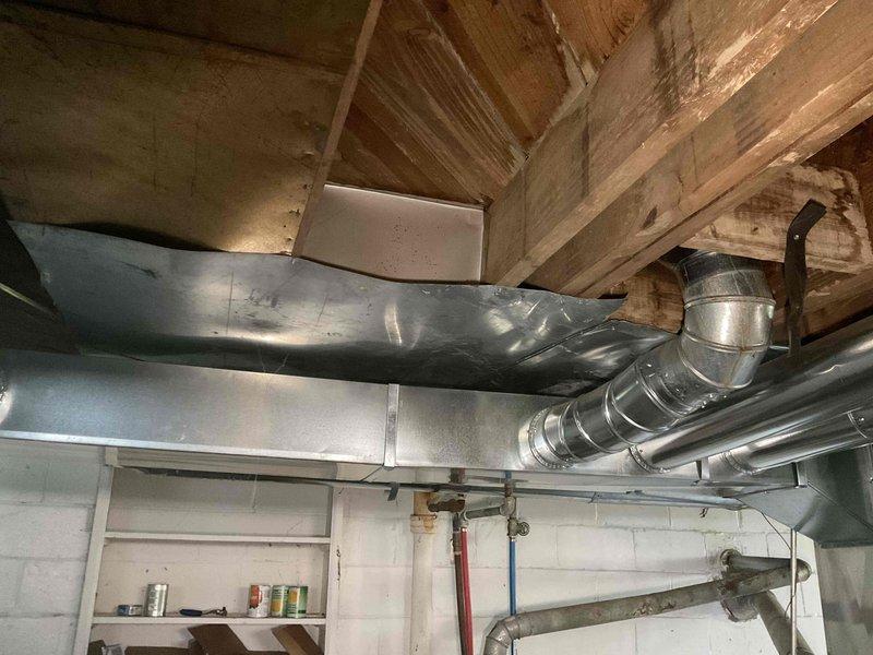 Provided estimate for furnace replacement in basement location. Current 5-year-old used furnace is operational. Customer evaluated proposal but elected to proceed with alternative contractor offering lower pricing.