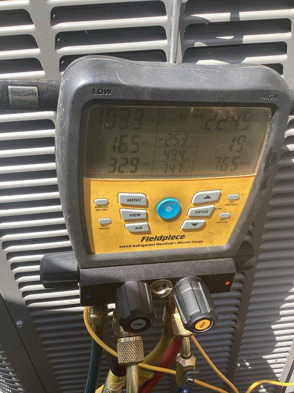 Completed annual cooling maintenance on residential split system air conditioning unit. Performed comprehensive system diagnostics using digital manifold gauge to verify refrigerant pressures and temperatures across both high and low sides of the system. All operating parameters found within manufacturer specifications. Inspected outdoor condenser unit exterior condition, confirmed proper airflow through coil and fan assembly, and verified unit operation. System operating normally with no deficiencies noted.
