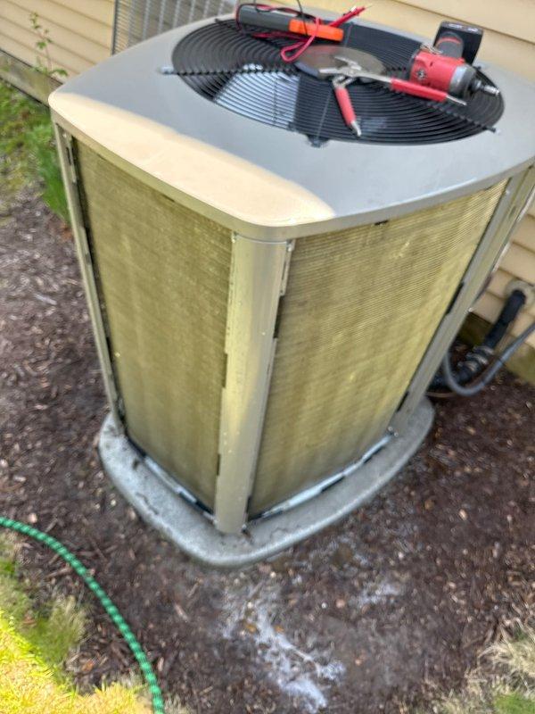 Completed annual cooling maintenance on residential outdoor condensing unit. Performed comprehensive system inspection, tested electrical components with multimeter, verified proper operation of condenser fan motor, and checked refrigerant pressures. Unit found operating within normal parameters with no immediate service needs identified.