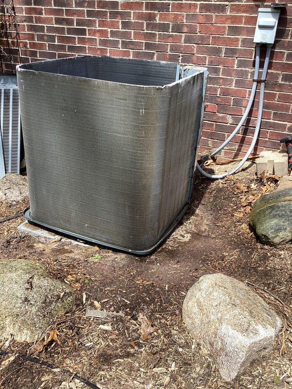 Completed annual spring maintenance on an 8-year-old residential central air conditioning system. Performed comprehensive AC tune-up including inspection of outdoor condenser unit, which showed significant accumulation of dirt, debris, and environmental buildup on exterior surfaces. Cleaned condenser coils and exterior housing to remove caked-on grime and organic matter that had accumulated over time. Inspected refrigerant lines, electrical connections, and disconnect box for proper operation. Verified system functionality and confirmed unit is operating within normal parameters. All components tested and system returned to proper working condition with no issues identified requiring immediate repair.