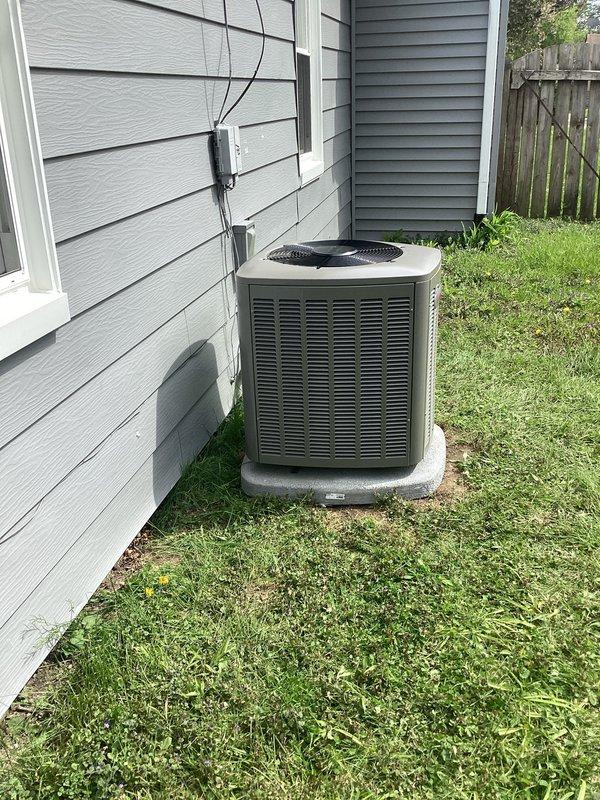 Successfully completed installation of a 2-ton air conditioning system with matching evaporator coil in left-side configuration. Installed new outdoor condensing unit on concrete pad with proper clearances, connected refrigerant lines, and established condensate drainage system utilizing existing PVC piping infrastructure in basement utility area. New dedicated electrical circuit was installed with appropriate conduit and wiring to power the system, and all mechanical and electrical permits were obtained prior to installation.