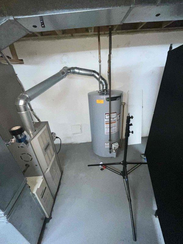 Conducted comprehensive full system estimate for 21-year-old Comfortmaker HVAC system in residential basement installation. Evaluated existing furnace unit, ductwork configuration, and overall system performance to provide replacement recommendations, with documented interior component inspection including blower motor assembly and control board assessment. Scheduled appointment accommodated requested late afternoon arrival window for customer convenience.