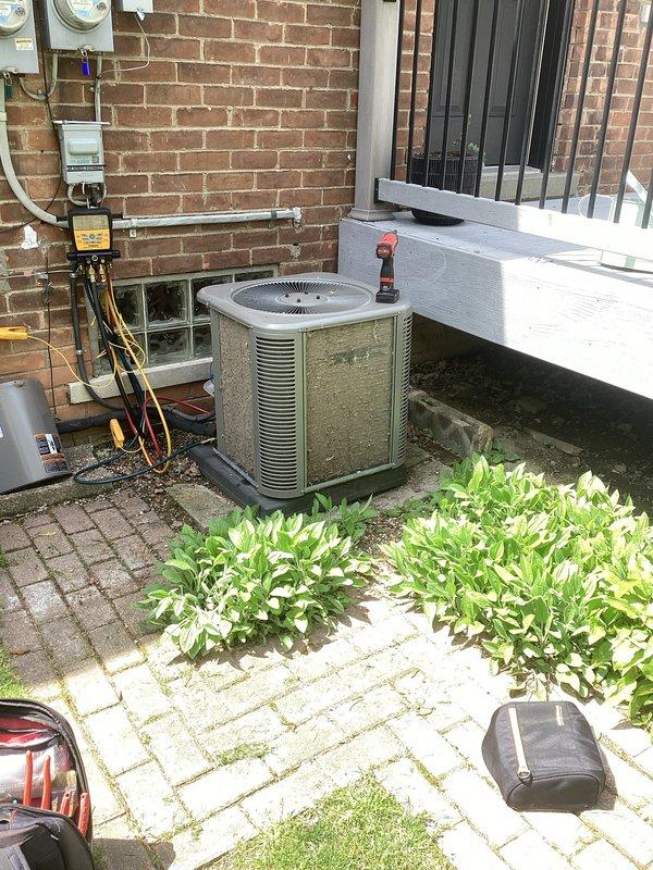 Completed annual maintenance on mini split system consisting of one indoor head unit and one outdoor condenser unit. Performed comprehensive inspection of refrigerant lines, service valves, and electrical connections on outdoor unit mounted on exterior brick wall. Cleaned indoor air handler filter, inspected drain line operation, and verified proper system operation under cooling mode. All components found to be functioning within normal parameters.