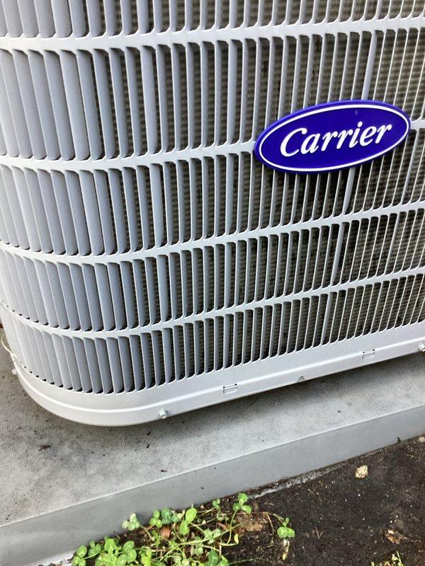 Performed routine annual cooling maintenance on Carrier condenser unit. Inspected exterior grille panels, louvers, and cabinet condition, confirming proper structural integrity and airflow pathways. Customer requires replacement filters and evaporator pads at next service interval.