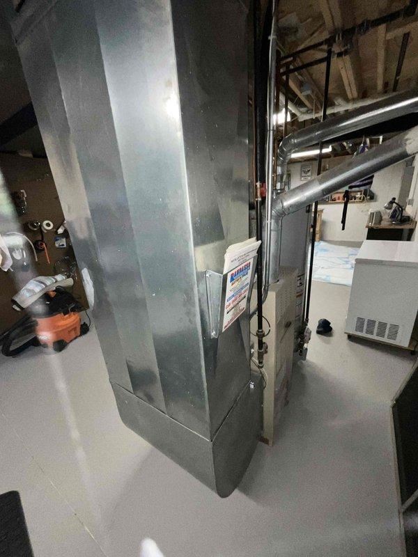Provided estimate for complete air conditioning system replacement on residential property with existing 20-year-old unit that has reached end of service life. Assessed current basement mechanical room configuration, including existing furnace/air handler, ductwork connections, electrical service, and available space for new equipment installation. Documented existing HVAC system layout and captured measurements to ensure proper sizing and compatibility for replacement condenser and any necessary air handler modifications required for efficient operation.