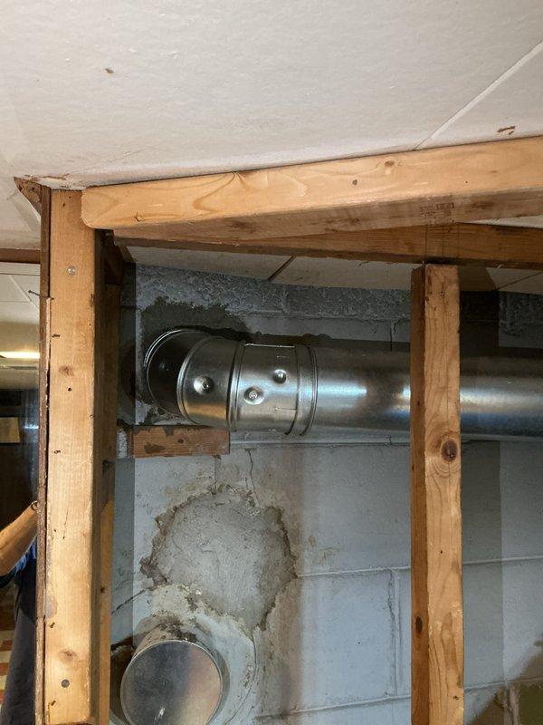 Completed callback service to finalize furnace installation by installing the chimney liner for the 70,000 BTU furnace unit. The liner was properly secured and vented through the existing chase, with all ductwork connections verified and sealed. All permit requirements for mechanical and electrical work were fulfilled, and installation paperwork was completed.