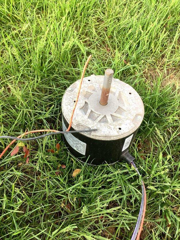 Diagnosed failed condenser fan motor on air conditioning unit and determined component to be covered under parts warranty. Removed defective motor from condenser unit and documented condition with photographs for warranty claim processing. Scheduled return visit to complete installation of replacement motor once warranty part is received.