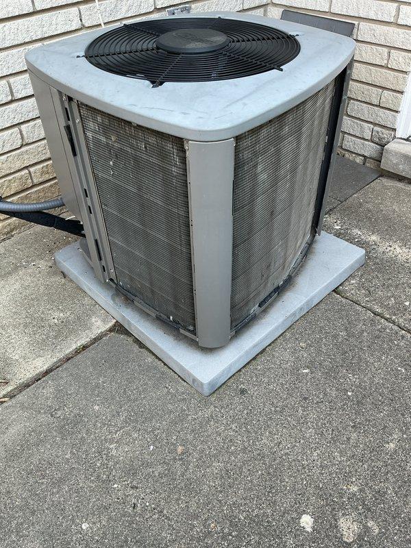 Performed annual cooling maintenance on residential outdoor condensing unit. Inspected condenser coils, fan operation, and electrical connections. Unit operating within normal parameters on concrete pad with adequate clearance. Noted filter replacement requirement for two locations at indoor air handler positions.