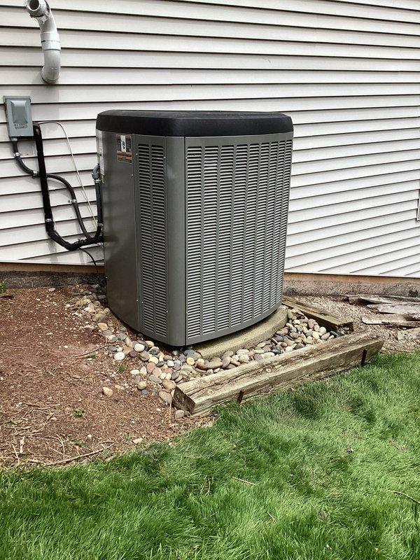 Completed annual cooling maintenance on residential split system heat pump unit. Performed comprehensive inspection of outdoor condenser including coil cleaning, electrical connections check, refrigerant pressure verification, and operational testing. Unit operating within manufacturer specifications with no deficiencies noted. All components functioning properly with adequate airflow through condenser coils and proper drainage confirmed.