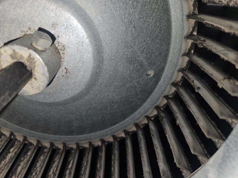 Completed annual heating and cooling maintenance on AHU system. Inspected blower assembly and noted significant dust accumulation on blower wheel fins requiring cleaning attention. Verified furnace operation with burner ignition test showing proper blue flame pattern and confirmed all internal components, wiring connections, and safety controls functioning correctly. Identified filter replacement needed for continued system efficiency.