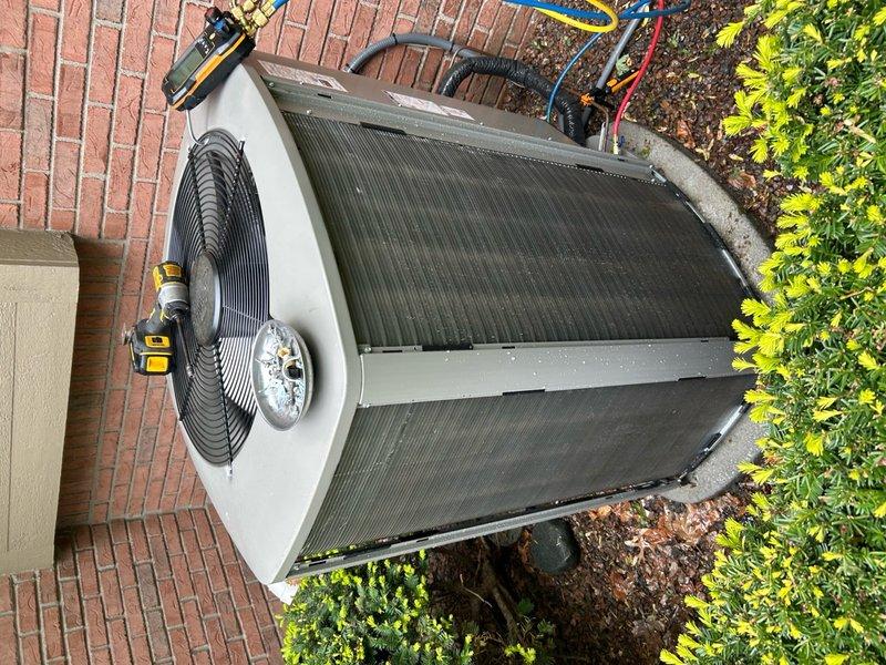 Completed scheduled preventive maintenance on residential air conditioning unit. Performed comprehensive system inspection, replaced air filter and evaporator pad, cleaned condenser coils which showed significant accumulation of dirt and organic debris, verified refrigerant pressures and electrical connections, and confirmed proper operation of all components including condenser fan assembly.