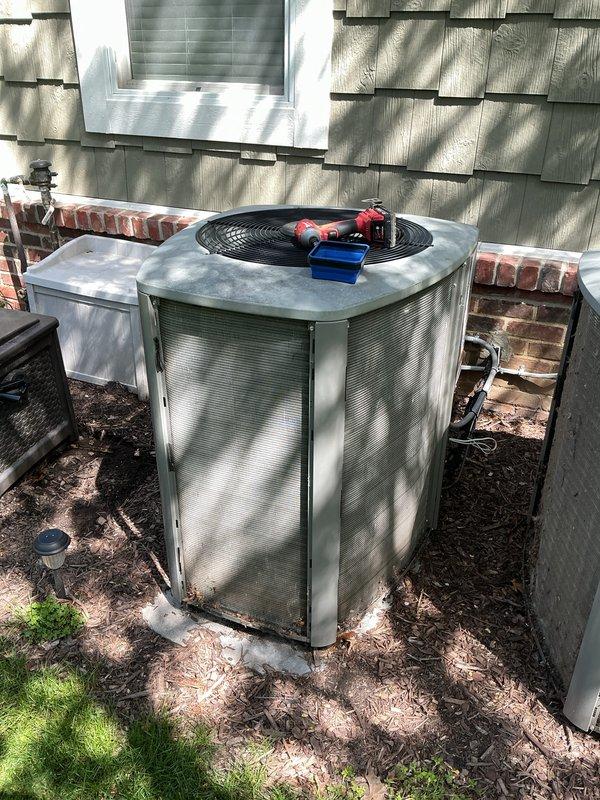 Completed annual preventive maintenance on two outdoor air conditioning condenser units. Performed comprehensive inspection of both systems including cleaning condenser coils, checking refrigerant lines and insulation, verifying electrical connections at disconnect boxes, and testing fan operation. All components found to be in proper working condition with no issues identified during the routine maintenance visit.