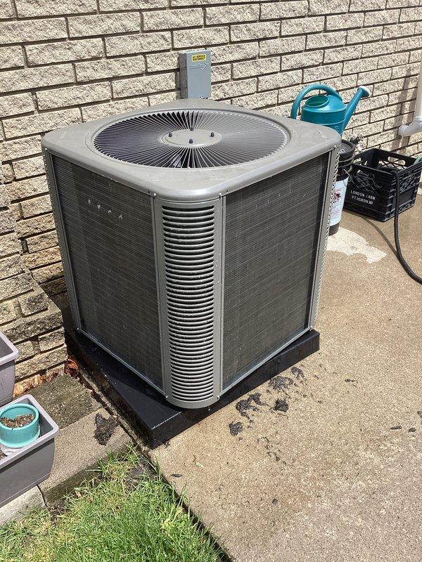 Completed scheduled Air Care Maintenance on residential air conditioning system. Performed comprehensive inspection of outdoor condenser unit, verified proper operation of compressor and condenser fan motor, checked refrigerant line connections for leaks, cleaned condenser coils and louvers to remove accumulated dirt and debris, and confirmed electrical disconnect box functionality. Unit operating within normal parameters with no deficiencies noted.