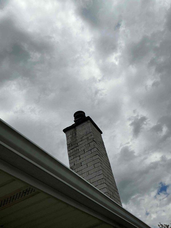 Conducted comprehensive estimate appointment for full HVAC system replacement at residential property. Assessed existing 28-30 year old furnace and air conditioning equipment located in basement utility area, documenting current system configuration including ductwork, venting through masonry chimney, and existing mechanical infrastructure. Photographed installation areas and exterior venting components to provide accurate system replacement proposal, noting both units have reached end of expected service life though currently operational without immediate safety concerns.