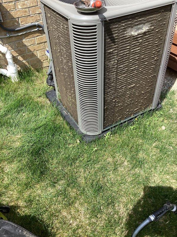 Completed routine Air Care Maintenance on residential cooling system. Replaced dirty air filter with new HCF16-11 (MERV 11) filter as customer was entitled to complimentary replacement. Inspected outdoor condenser unit and noted heavy accumulation of dirt, dust, and debris on condenser coils requiring attention. Documented equipment condition with photos showing clogged coil fins and overall system wear, which may impact cooling efficiency if not addressed during future maintenance.
