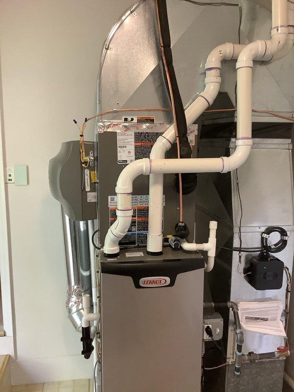 Completed installation of 2.5-ton air conditioning system with evaporator coil at rear location of residence. Successfully obtained mechanical and electrical permits prior to installation, then installed new Lennox furnace with integrated coil, configured refrigerant lines, established proper drainage with PVC condensate piping, and reconnected all necessary electrical connections. System tested and operational upon completion.