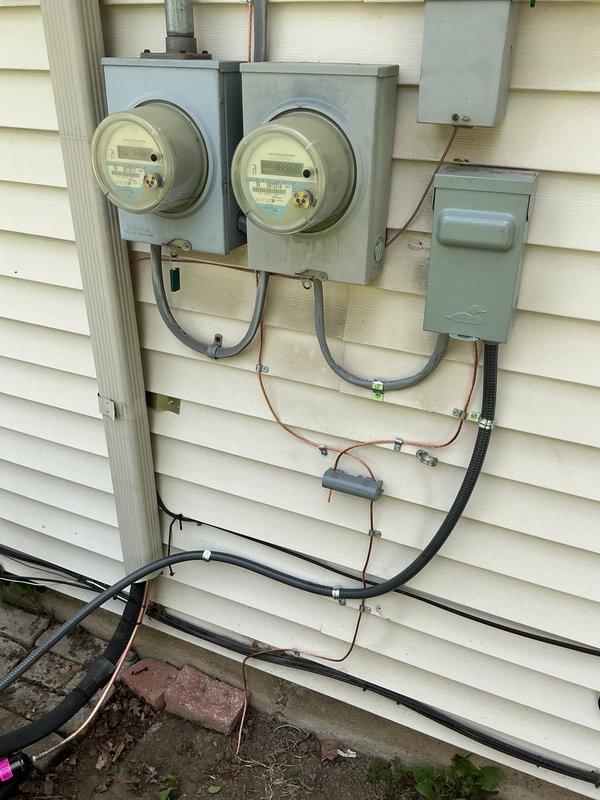 Completed full HVAC system installation including a 70,000 BTU furnace and 2-ton air conditioning unit with rear yard condenser placement. Installation included all necessary venting with PVC piping, ductwork integration, electrical connections at dual meter setup, and system reconnection. All mechanical and electrical permits were obtained prior to installation, and the complete system was tested and verified operational in the utility room location.