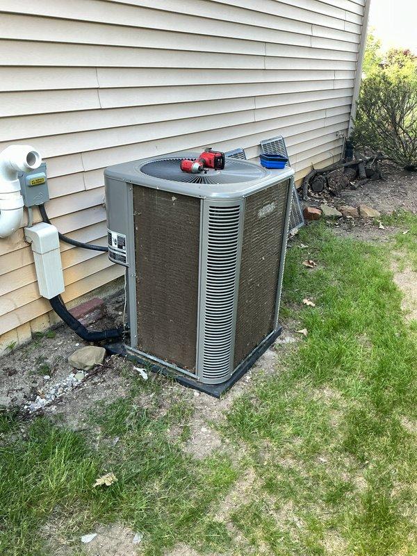 Completed annual cooling maintenance on residential air conditioning system. Performed comprehensive inspection of outdoor condenser unit, tested electrical components and refrigerant pressures, verified proper operation of fan motor and compressor, checked condensate drainage system and PVC piping for proper flow, and confirmed all safety controls functioning within manufacturer specifications. Unit operating efficiently with no issues identified.