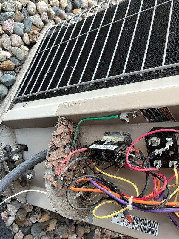 Completed AHC maintenance service on split system HVAC unit. Inspected indoor furnace components including heat exchanger, burner assembly, gas valve, and electrical connections - all found in proper working condition. Serviced outdoor condensing unit where significant mud dauber wasp nest accumulation was discovered in the electrical compartment around wiring and contactor. Removed biological debris, cleaned affected components, and verified all electrical connections were secure. System tested and returned to normal operation.