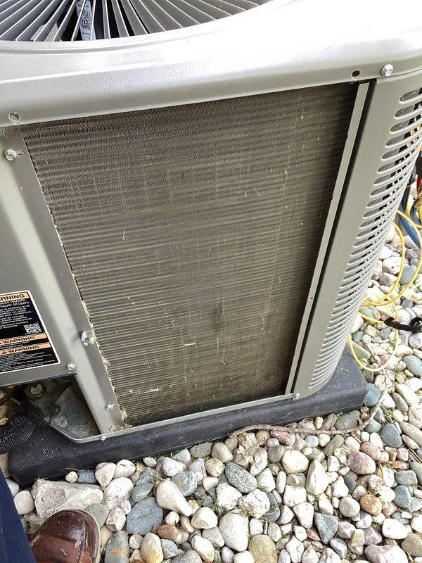 Completed annual preventive maintenance on Lennox residential air conditioning system. Performed comprehensive inspection of condenser unit, verified proper operation of fan motor and compressor, and documented equipment condition with photos showing coil assembly with normal dust accumulation for seasonal operation.