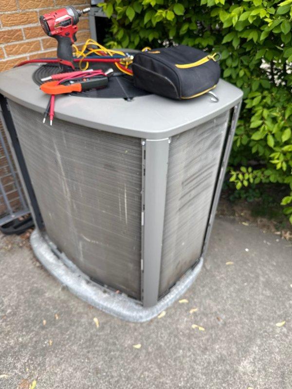 Completed annual cooling maintenance on residential air conditioning system. Performed comprehensive inspection of outdoor condenser unit, verified operational status, and noted customer request for filter and pad replacement. Unit found in good working condition with minimal debris accumulation on exterior surfaces.