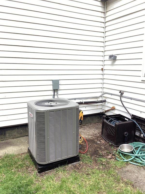 Completed full installation of 2-ton air conditioning system with matching evaporator coil at rear of residence. Installed new outdoor condensing unit on pad with proper refrigerant line connections, electrical disconnect, and secure mounting to exterior wall. Indoor evaporator coil installed in mechanical room with new refrigerant lines, proper drainage connections, and electrical reconnection to existing system. All mechanical and electrical permits obtained prior to installation. System startup completed with refrigerant charge verification, airflow testing, and operational checks confirming proper cooling performance across all parameters.