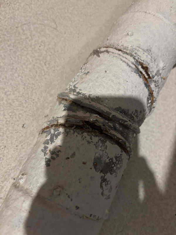 Completed comprehensive HVAC estimate for full system replacement in basement installation serving small to mid-sized residential space up to 1200 square feet. Assessed existing heating and cooling equipment including aged furnace unit and water heater, documenting significant deterioration of metal piping and conduit connections with extensive rust, corrosion, and paint failure indicating moisture exposure and end-of-service-life conditions. Provided detailed quote for natural gas or propane-fired heating and cooling system replacement with properly sized equipment and updated ductwork connections to address current system deficiencies.
