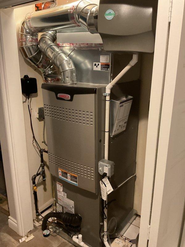 Completed day two of a full HVAC system installation including a 110,000 BTU furnace, 3-ton Lennox air conditioning unit with left-side configuration, and ductwork alterations. Installed outdoor AC unit on concrete pad with proper electrical disconnect, positioned furnace in utility closet with modified ductwork routing, and reconnected all necessary components. All mechanical and electrical permits were previously obtained, and system was fully commissioned and operational upon completion.