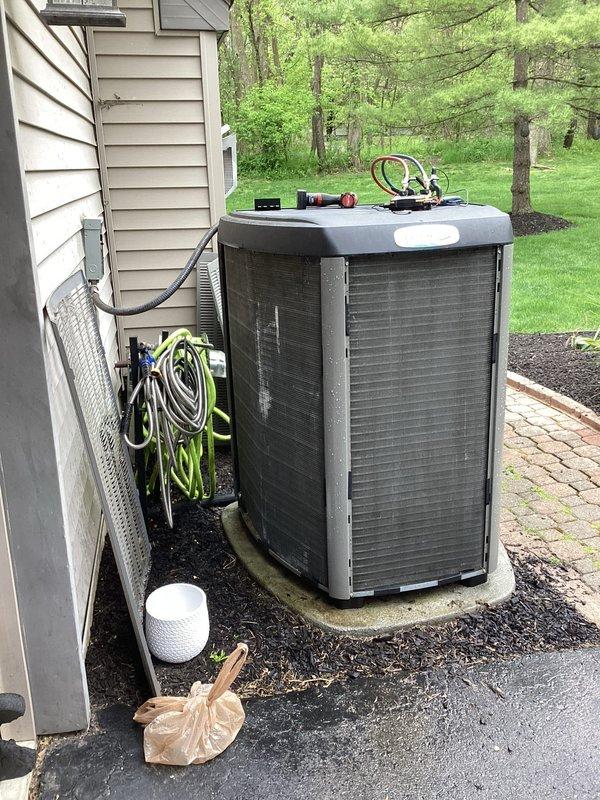Completed annual cooling maintenance on residential outdoor condensing unit. Performed comprehensive system inspection, cleaned condenser coils, checked refrigerant levels, tested electrical connections, and verified proper unit operation to ensure optimal performance for the upcoming cooling season.