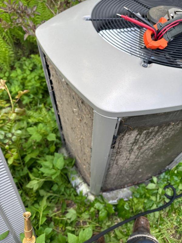 Completed annual cooling maintenance on residential outdoor condenser unit. Performed system diagnostics using test equipment, inspected electrical connections and components, and verified proper fan operation. Changed air filter as needed per maintenance protocol and confirmed unit operational status with adequate clearance from surrounding vegetation.