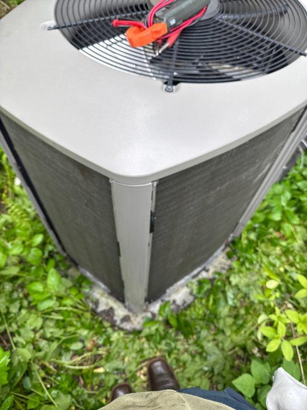 Completed annual cooling maintenance on residential outdoor condenser unit. Performed system diagnostics using test equipment, inspected electrical connections and components, and verified proper fan operation. Changed air filter as needed per maintenance protocol and confirmed unit operational status with adequate clearance from surrounding vegetation.