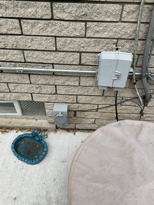 Conducted comprehensive site assessment for electrical panel upgrade at residential property. Documented existing electrical service equipment, exterior meter enclosure, and HVAC system connections to evaluate current electrical load requirements and determine specifications for panel replacement. Verified accessibility to electrical service entrance and confirmed clear pathway for installation work.