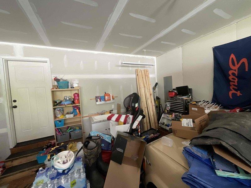 Conducted on-site evaluation for new garage heater installation in residential detached garage. Assessed garage space dimensions, electrical infrastructure, and mounting locations for overhead unit heater. Evaluated existing storage configuration and clearance requirements for safe heater placement. Provided recommendations for BTU capacity based on square footage and insulation conditions observed in unfinished garage space with exposed ceiling beams.