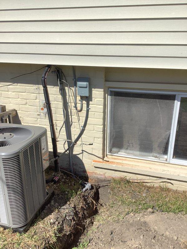 Installed sub-panel to provide dedicated electrical service for HVAC system. Trenched underground conduit run from main service to new panel location, mounted exterior disconnect box on building foundation, and completed all necessary wiring connections. All work performed to code specifications with proper grounding and circuit protection in place.